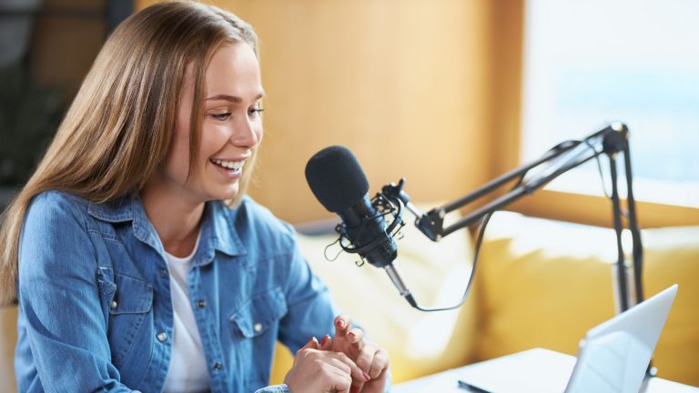 A podcaster recording a show