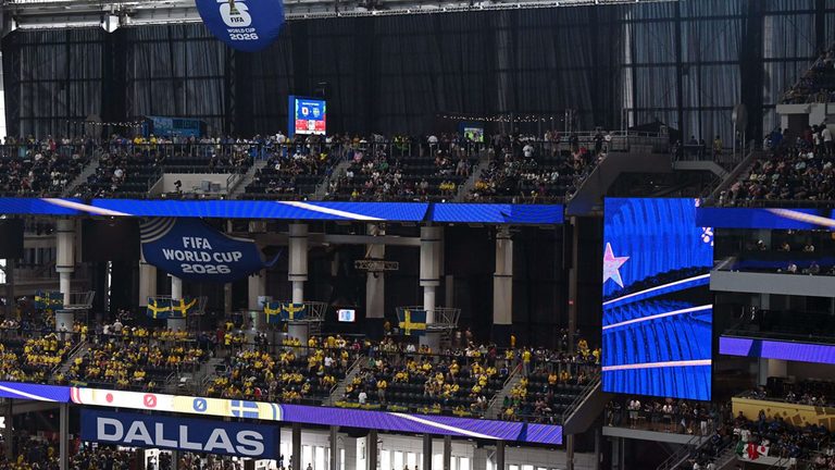 At T Stadium Installs Curtains For World Cup Match