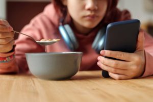 Families Struggle With Device Use During Meals