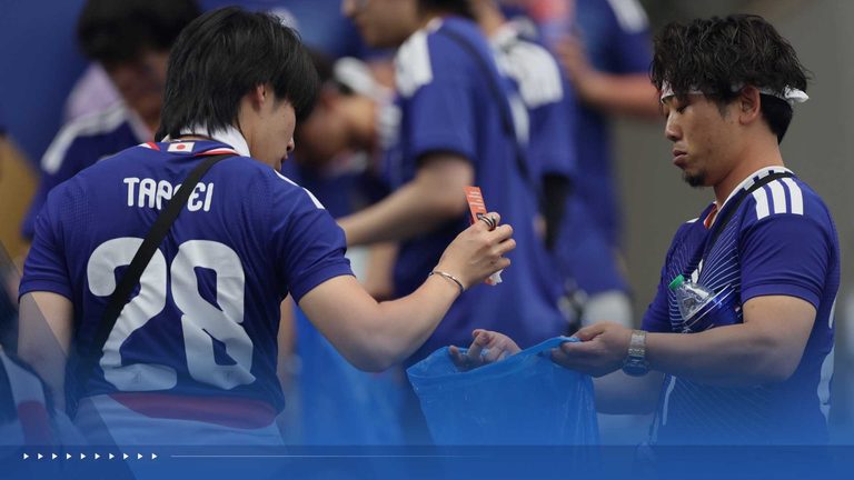 Japanese Fans Clean Up Stadium