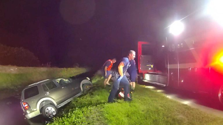 Woman Rescued After Suv Backs Into Canal