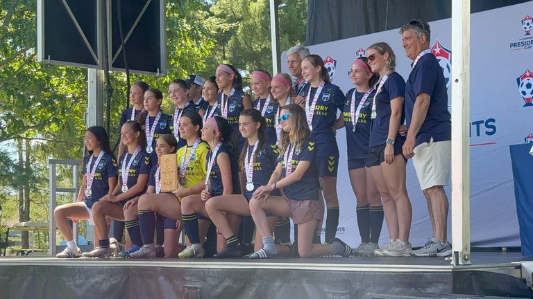 Young Soccer Players Compete