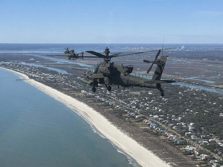 Apache Pilots Grounded After Patriotic Flyover