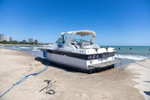 Chicagoans Try To Dislodge Stuck Boat