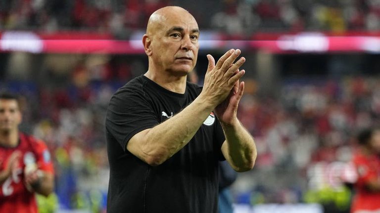 Egypt Coach Waves Palestinian Flag