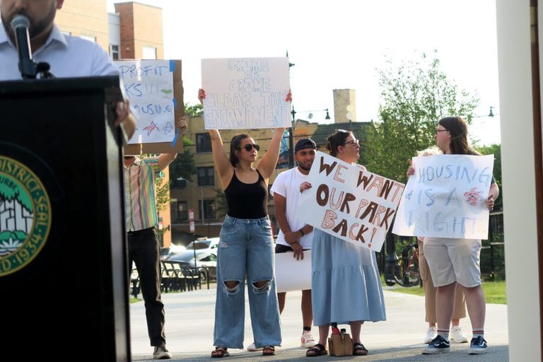 Homeless Encampment Dispute Overshadows Ronan Park Plaza Debut
