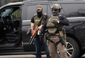 Ice Halts Vehicle Stops After Shootings