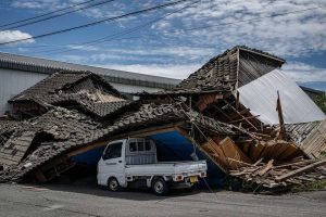 Japan Quake Kills 18