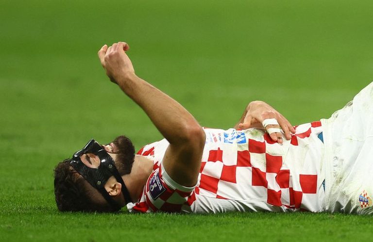 Soccer Players Wear Masks
