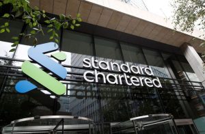 Stanchart Profit Rises 9