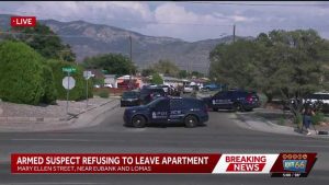 Albuquerque Police Negotiate With Armed Suspect