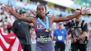 Cooper Wins 100M Hurdles Gold