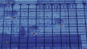 Grimes Wins 1500M Free Title