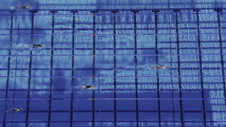 Grimes Wins 1500M Free Title