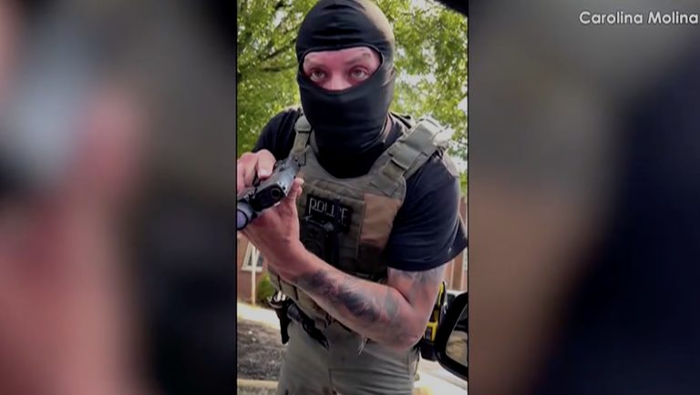 Ice Agent Points Gun At Woman