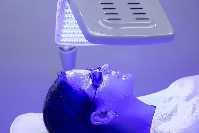 Blue Vs Red Light Therapy How Each Helps Acne Aging And Rosacea