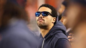 Caleb Williams Walks The Bears Sideline During Anthem While Nursing Hamstring In