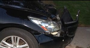 Car Jumps I 75 Fence And Crashes Into Parked Vehicle In Madison Heights