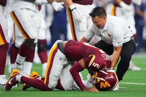 Commanders Quarterback Jayden Daniels Carted Off With Repeat Left Elbow Injury