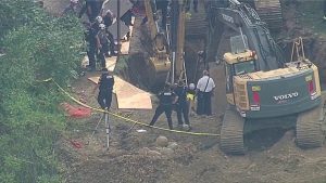 Emergency Crews Respond To Trench Collapse In Oxford Township