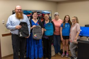 Hospital Staff Donate 300 Backpacks And 350 Books To Elementary Students In Olea