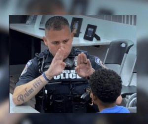 Impd Officer And Local Deaf Youth Use Sign Language To Bridge Community Ties