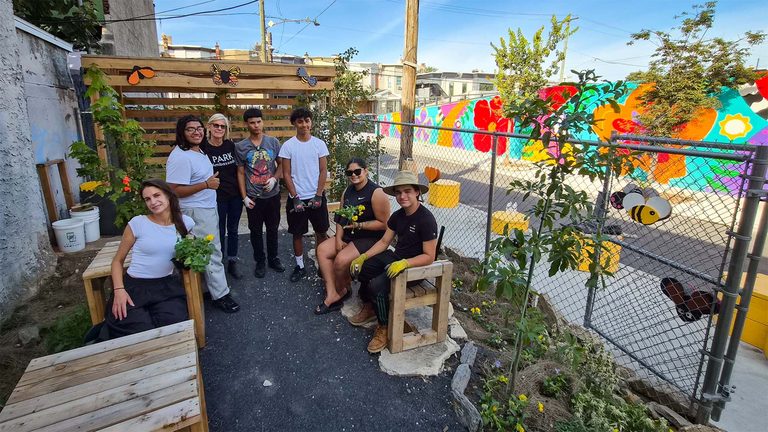 Kensington Residents Turn Former Dump Site Into Thriving Public Garden