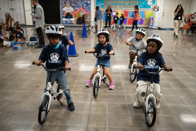 Kindergartners In California And Washington Learn To Ride Bikes In School Gyms