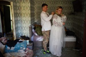 Kyiv Couple Marries Despite Russian Strike That Shattered Their Home
