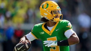 Oregon Ducks Coach Dan Lanning Explains Quarterback Dante Moore S Post Game Abse