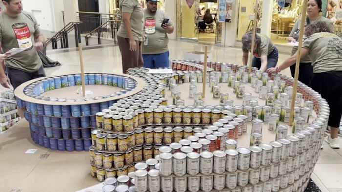 San Antonio Architects And Engineers Build Giant Can Sculptures To Fight Hunger