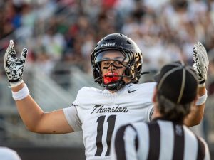 Thurston Defeats Churchill 34 16 In Midwestern League Opener