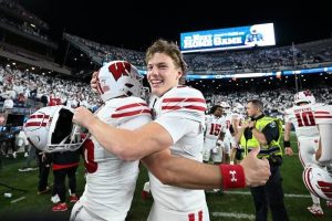 Wisconsin Rallies In Final Minutes To Upset No 13 Penn State 24 20