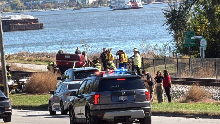 Car Flips Onto Davenport Train Tracks Near East River Drive One Injured