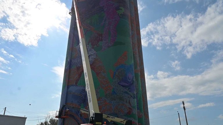 Glendive Grain Silo Transformed Into Vibrant Mural To Boost Tourism And Arts