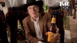 Gov Greg Abbott Greets Tmz Reporter With A Shiner Bock And A Friendly Jab