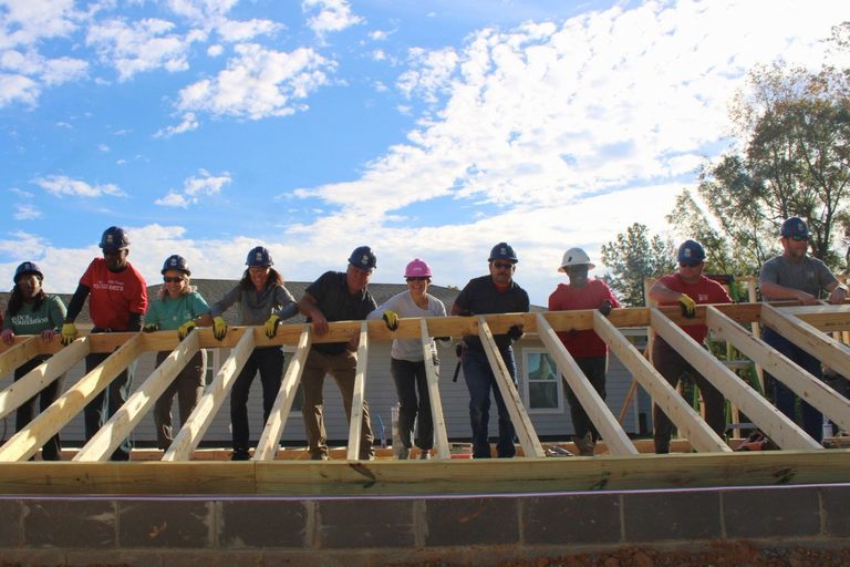 Habitat For Humanity Ceos Frame Saban Smart Home For Local Family In Tuscaloosa