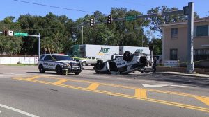 Hart Bus Driver Cited After Tampa Police Cruiser Flips In Intersection Crash