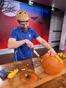 Morning News Team Holds Friendly Pumpkin Carving Contest