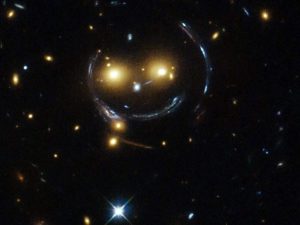 Nasa Shares Striking Galaxy Cluster Image That Looks Like A Smiling Face