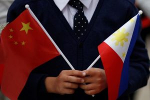 Philippines Coast Guard Deploys Largest Vessel To Expel Chinese Survey Ship Near