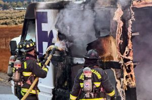 Reno Firefighters Extinguish Fire In Fedex Truck On Highway 395