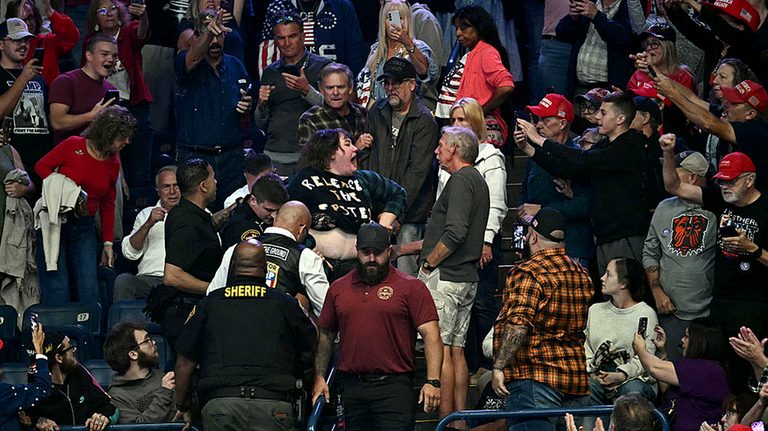 Trump Rally In Youngstown Sees Supporter Punch Protester And President Mocks Her