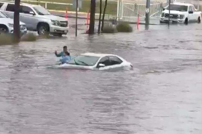 Two Immigrant Workers Rescue Woman From Flooded Midland Street