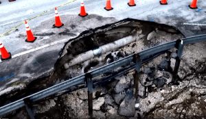 Water Main Break Creates Large Hole On South Pine Island Road In Davie