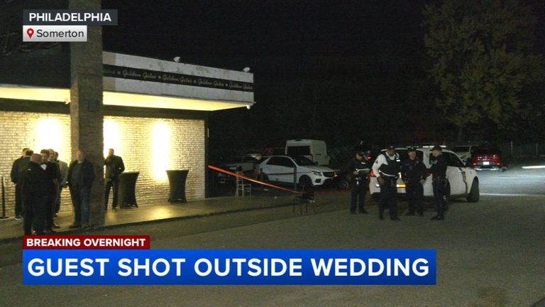 Wedding Guest Shot Outside Golden Gates Restaurant In Somerton